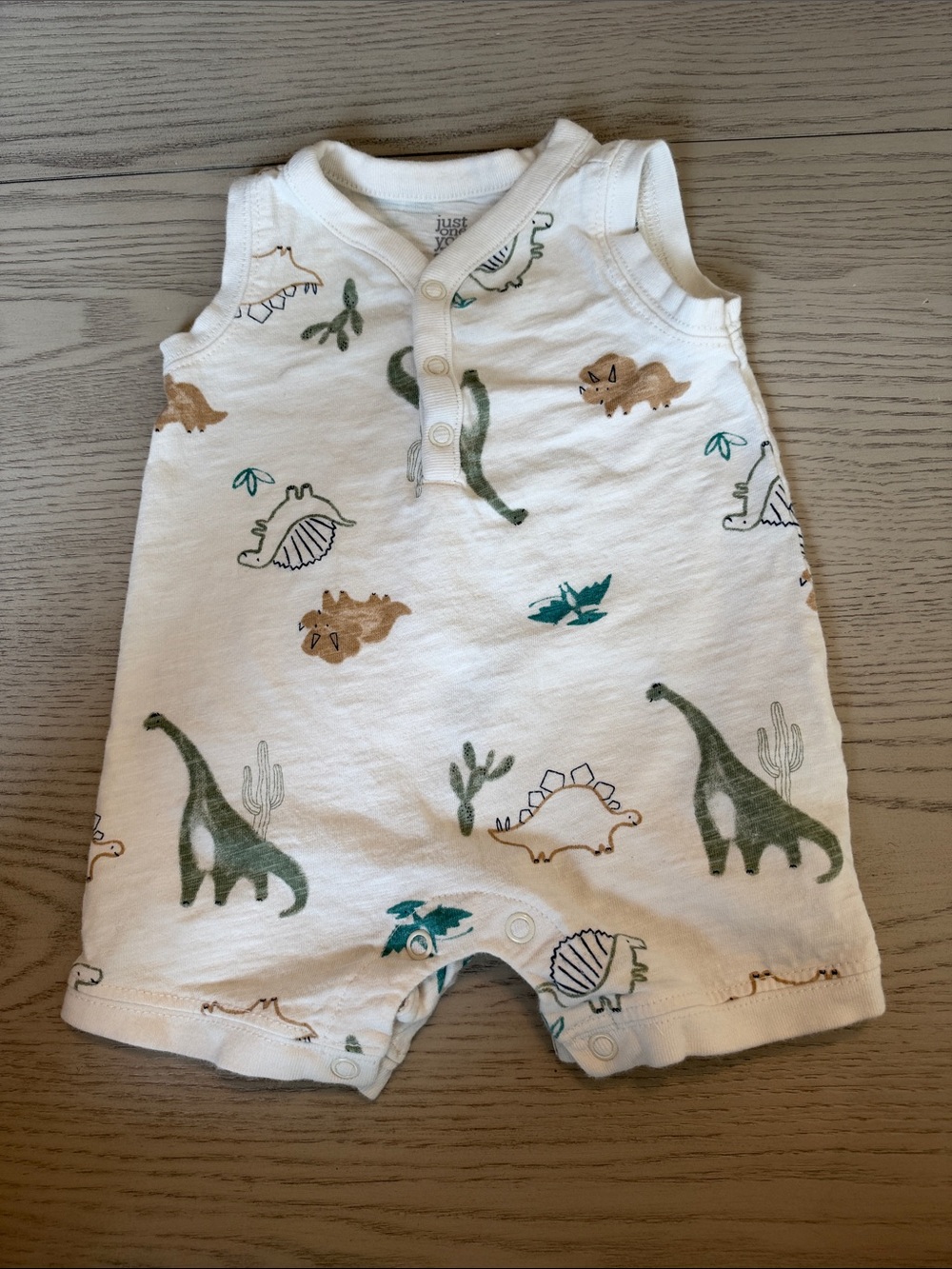 Sleeveless White Dinosaur Print Baby One-Piece